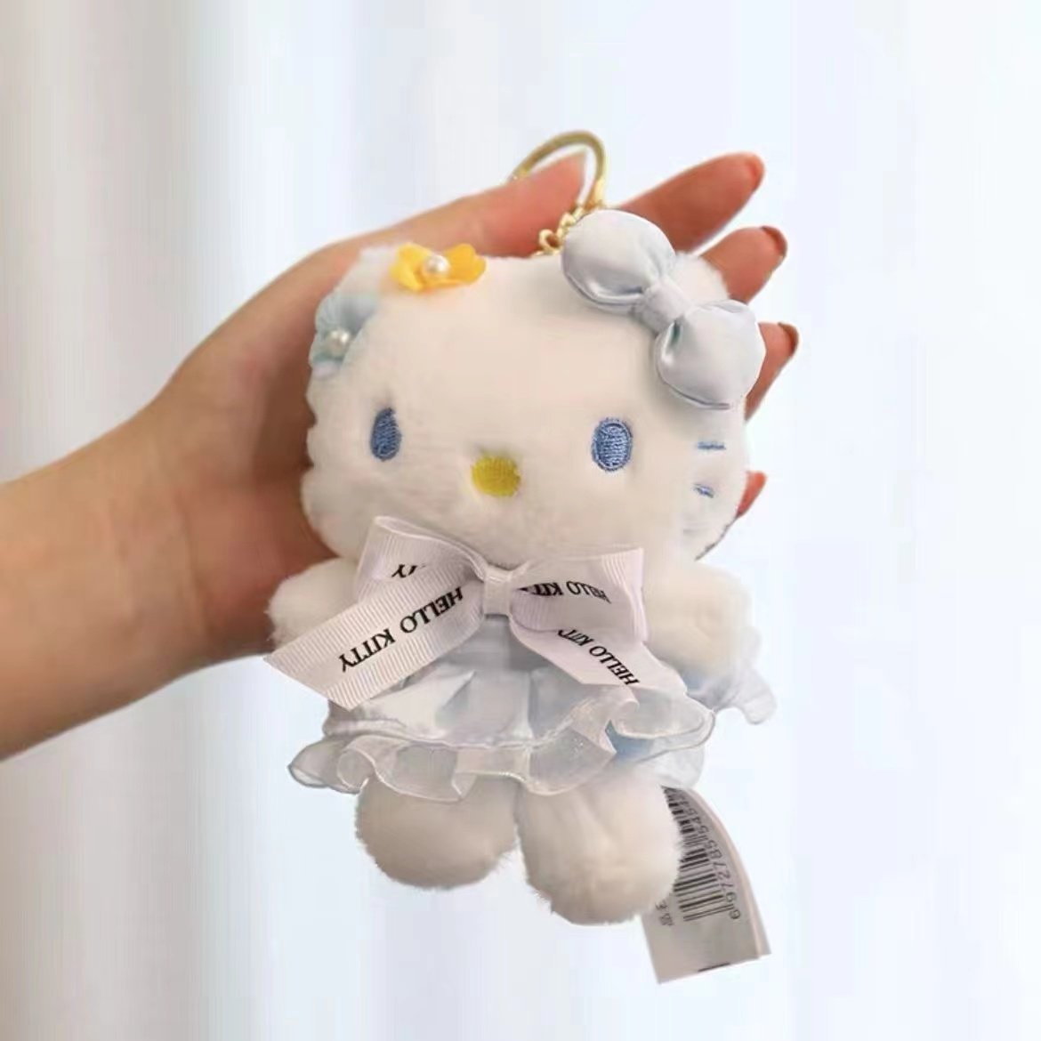 Hello Kitty Blue Bowtie Pearl Flower Keychain